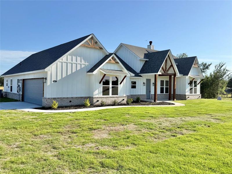 Front exterior of a new home in , Weatherford, TX, highlighting curb appeal (Image 18).