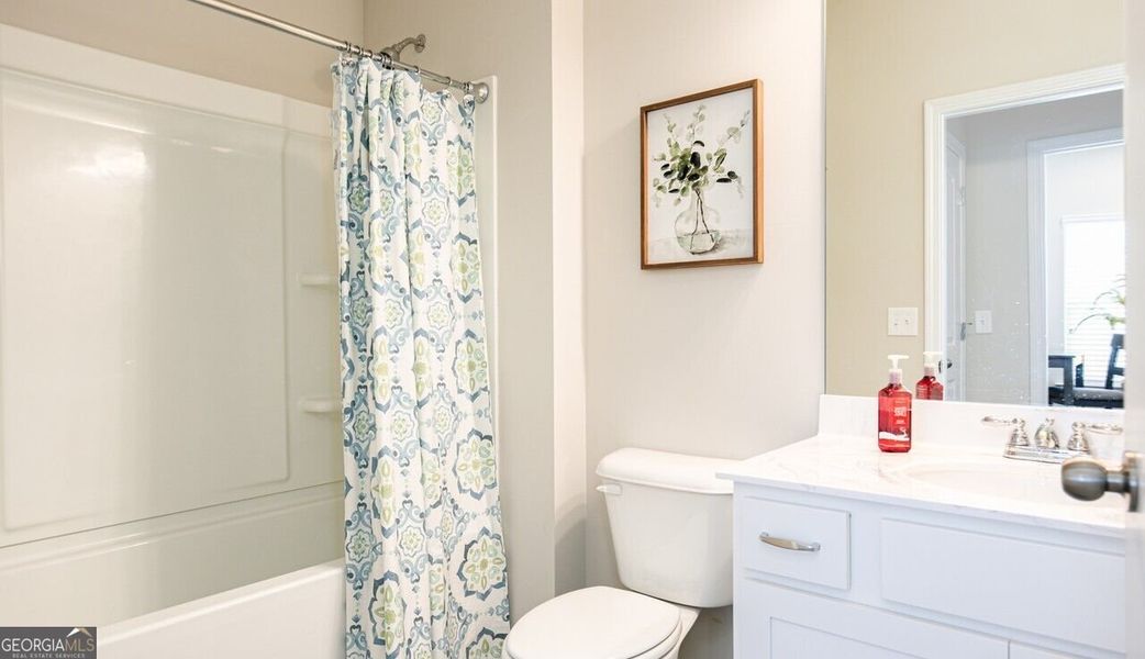 Furnished interior view inside a new home in The Cottages of Silvertown, Thomaston (Image 27).