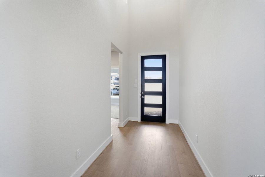 Spacious, unfurnished interior of a new home in The Woodlands at Medina Hills, Mico (Image 19).