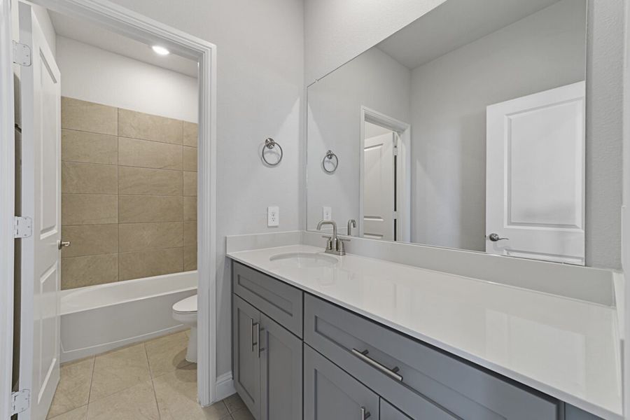 Representative furnished interior of a home built from the Symmetry D370 by Landon Homes in Lexington Frisco, Frisco (Image 3).