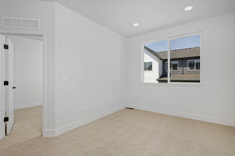 Spacious, unfurnished interior of a new home in Loretto Heights - Rise Collection, Denver (Image 18).