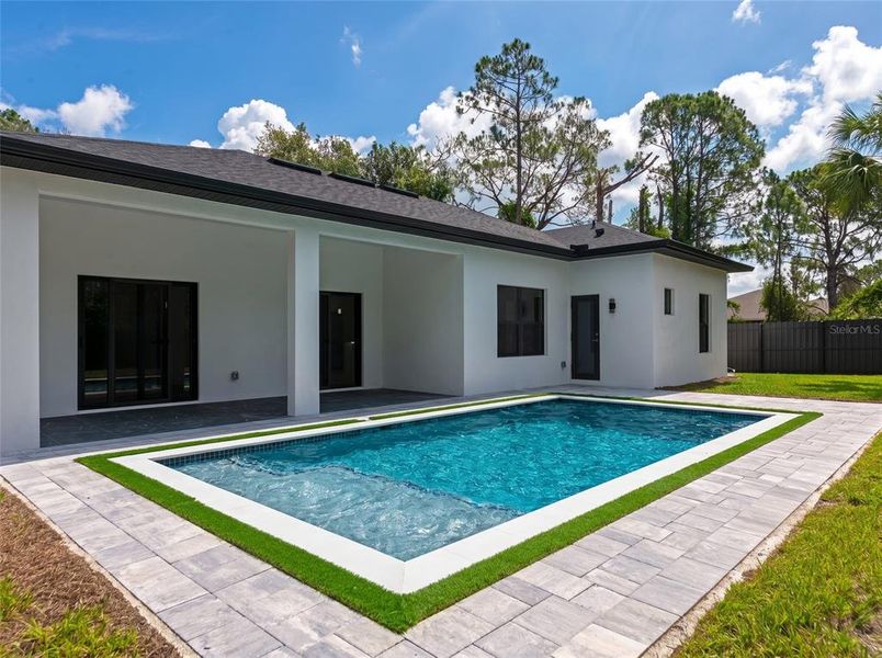 Exterior details and patio area of a home in , North Port (Image 22).