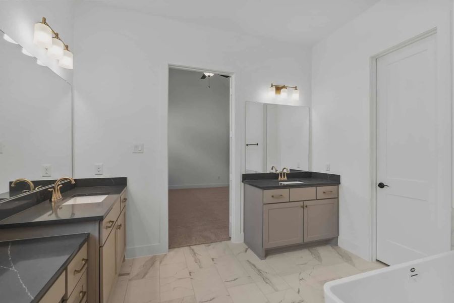 Representative furnished interior of a home built from the Nicklaus by Chesmar Homes in Riceland Alley Loads, Mont Belvieu (Image 17).