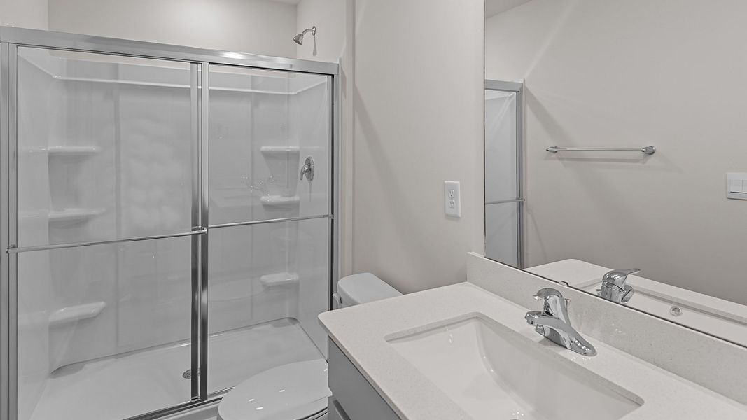 Furnished interior view inside a new home in Edinborough Townes, Gibsonville (Image 6).