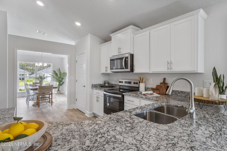 Furnished interior view inside a new home in Summerglen, Jacksonville (Image 5).
