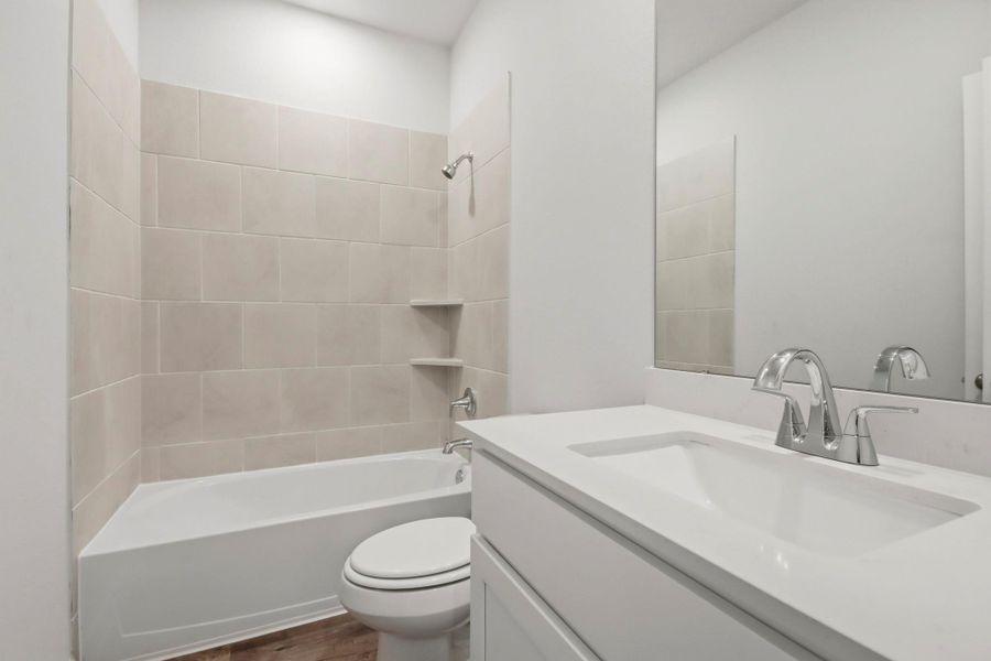 Furnished interior view inside a new home in Granger Pines, Conroe (Image 9).