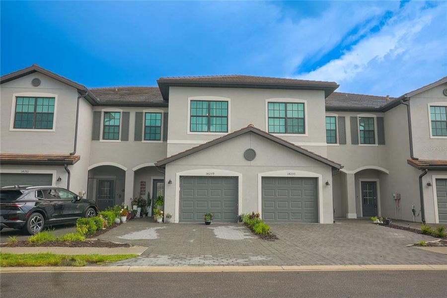Front exterior of a new home in , Fort Myers, FL, highlighting curb appeal (Image 2).