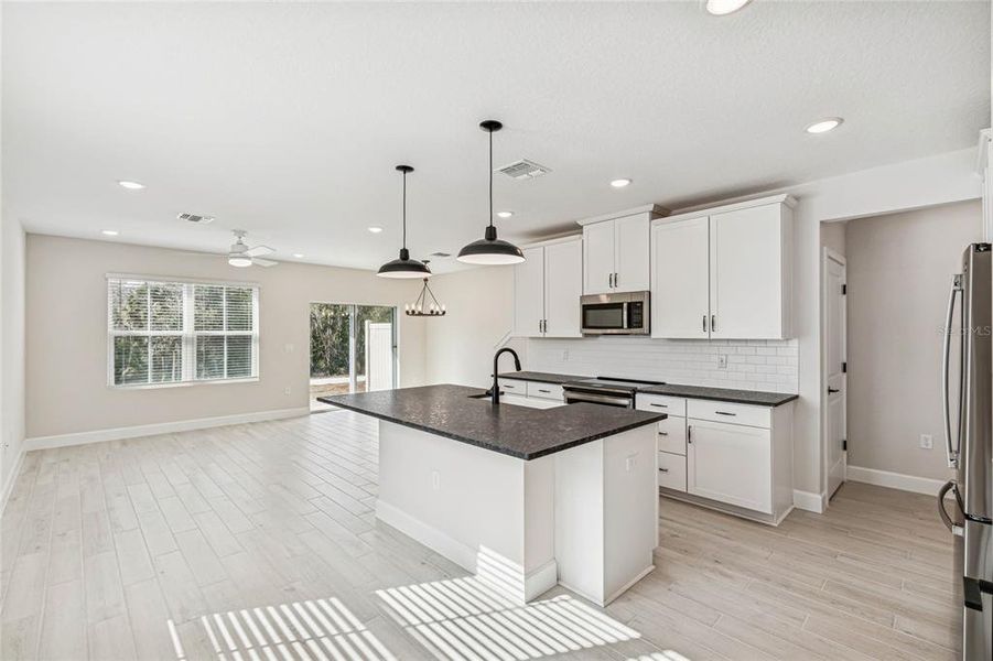 Furnished interior view inside a new home in Aspire at Canter Creek, Davenport (Image 7).