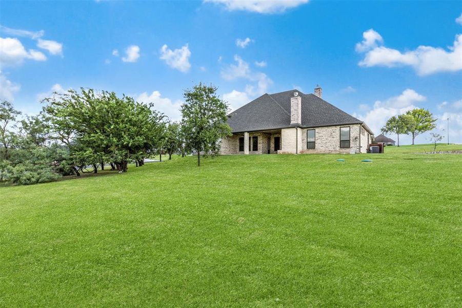 Front exterior of a new home in , Weatherford, TX, highlighting curb appeal (Image 26). Front exterior of a new home in , Weatherford, TX, highlighting curb appeal (Image 26).