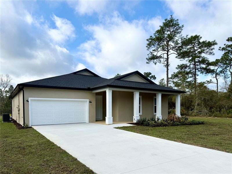 Front exterior of a new home in , Eustis, FL, highlighting curb appeal (Image 21).