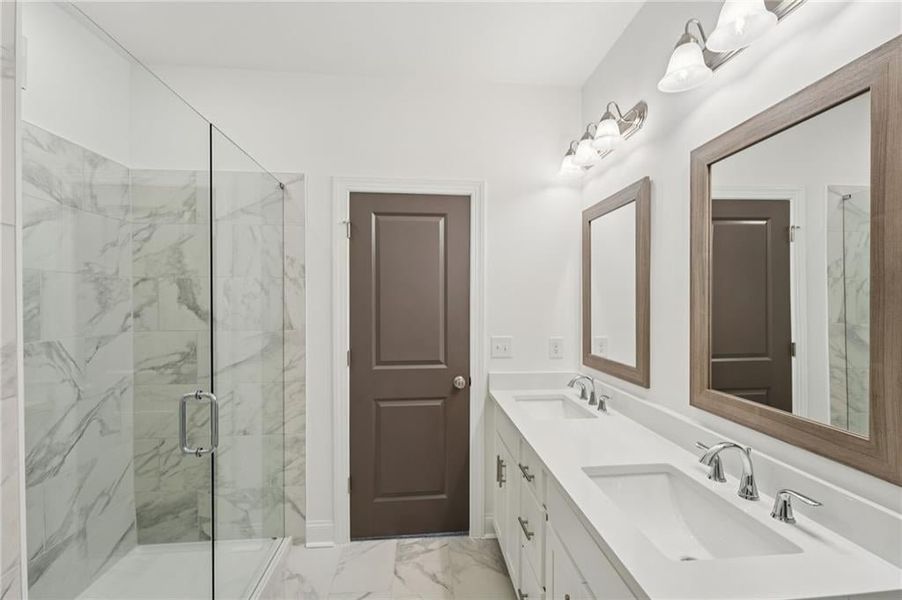 Primary bedroom with double vanity