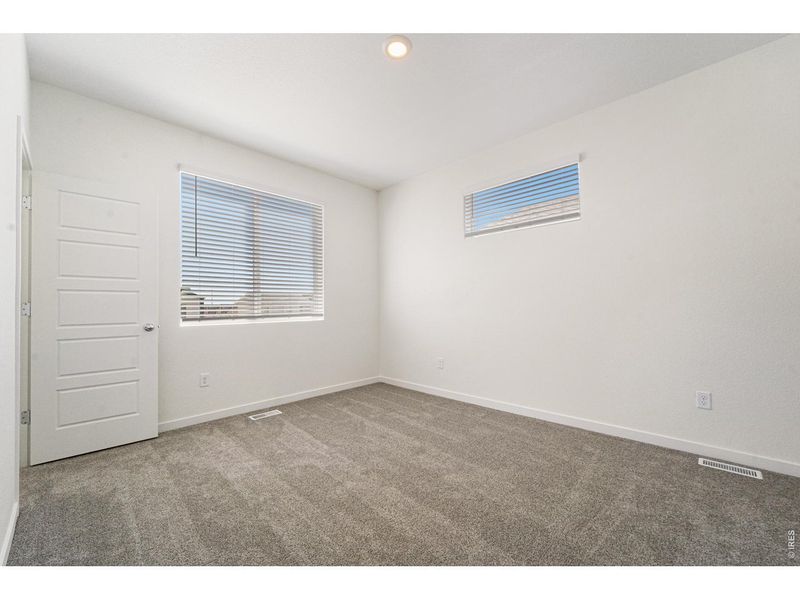 Spacious, unfurnished interior of a new home in Liberty Draw, Evans (Image 20).