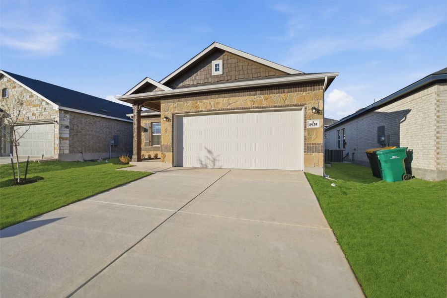 Front exterior of a new home in Notting Hill, Converse, TX, highlighting curb appeal (Image 19).