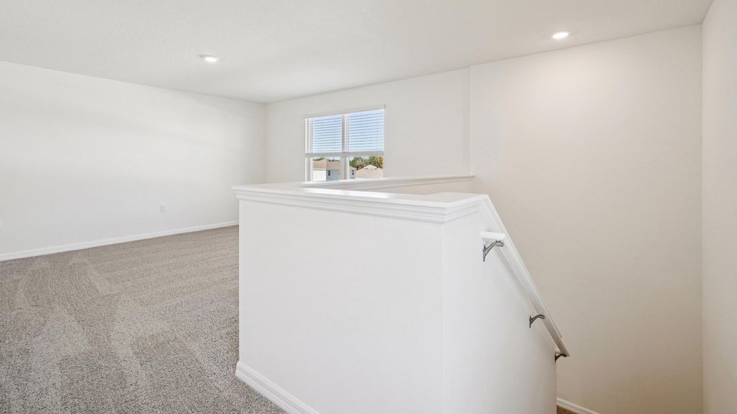 Representative unfurnished interior of a home built from the Ensley by D.R. Horton in Sandal Key, Weeki Wachee (Image 22).