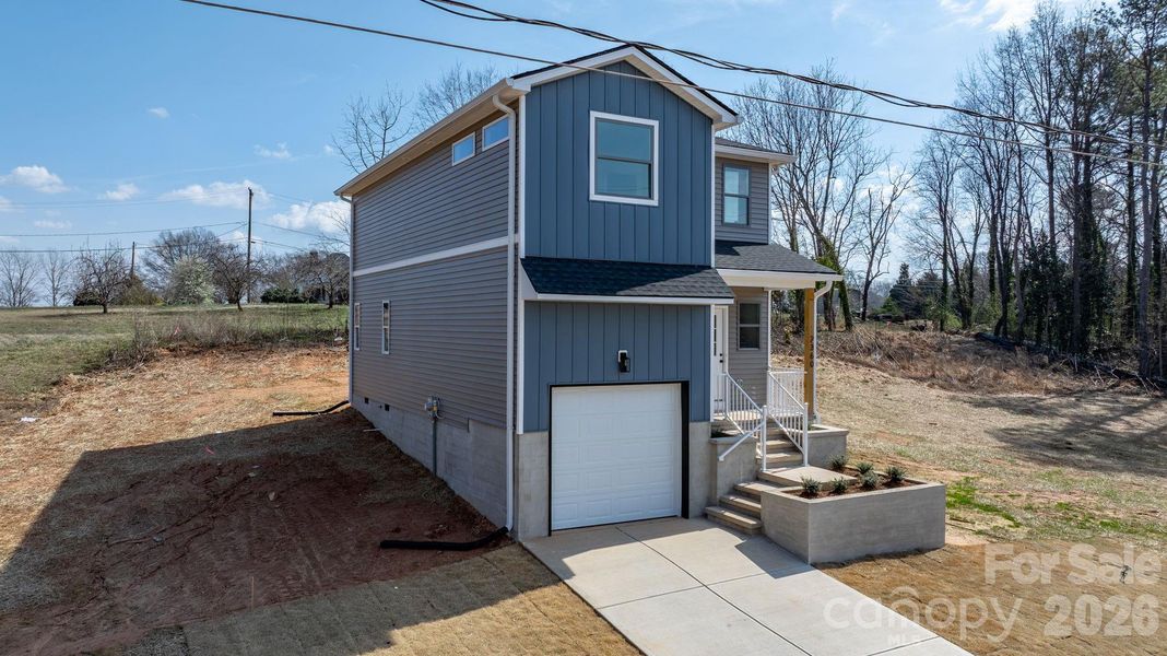 Front exterior of a new home in , Catawba, NC, highlighting curb appeal (Image 24).