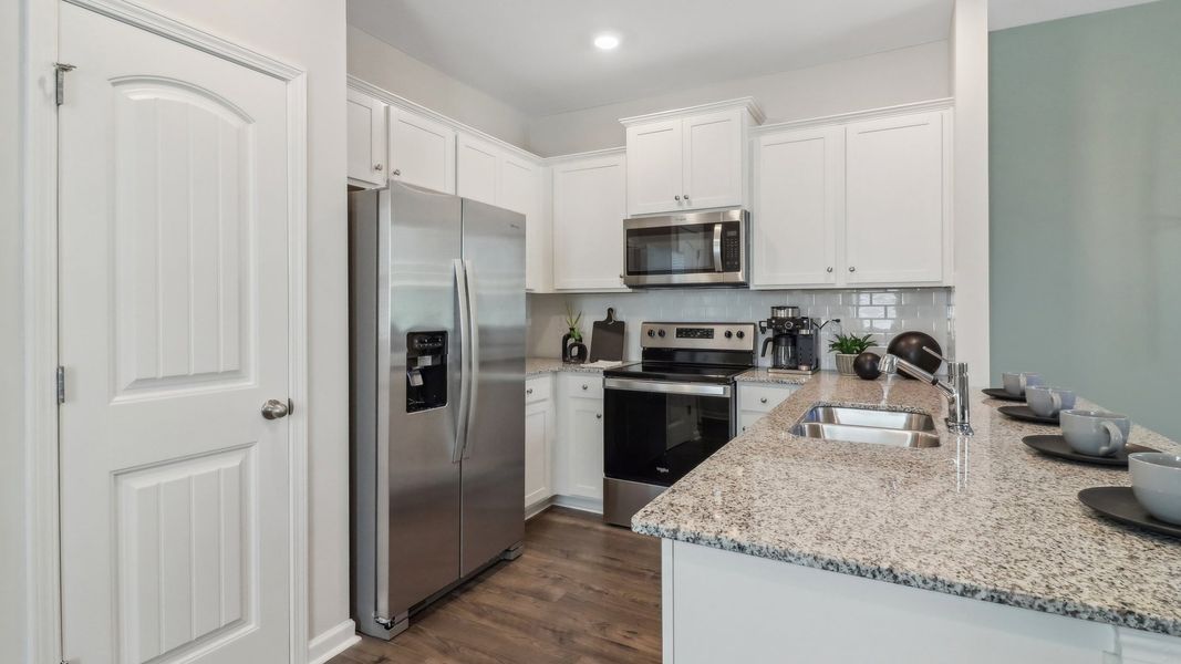 Furnished interior view inside a new home in Wellington Park, Lithonia (Image 19).