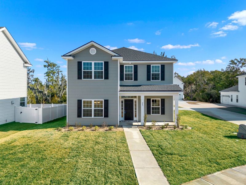 Representative exterior photo of a completed home built from the Oscar Mulberry by Ernest Homes in Dunham Marsh- The Villas, Richmond Hill, GA (Image 19).