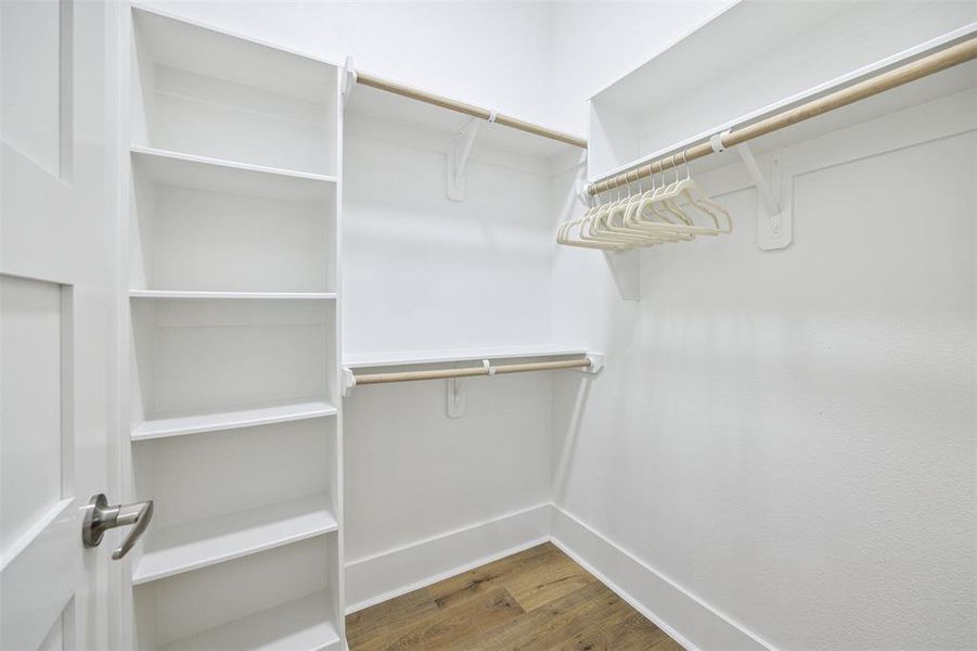 One of the two large walk in closets in the primary suite.