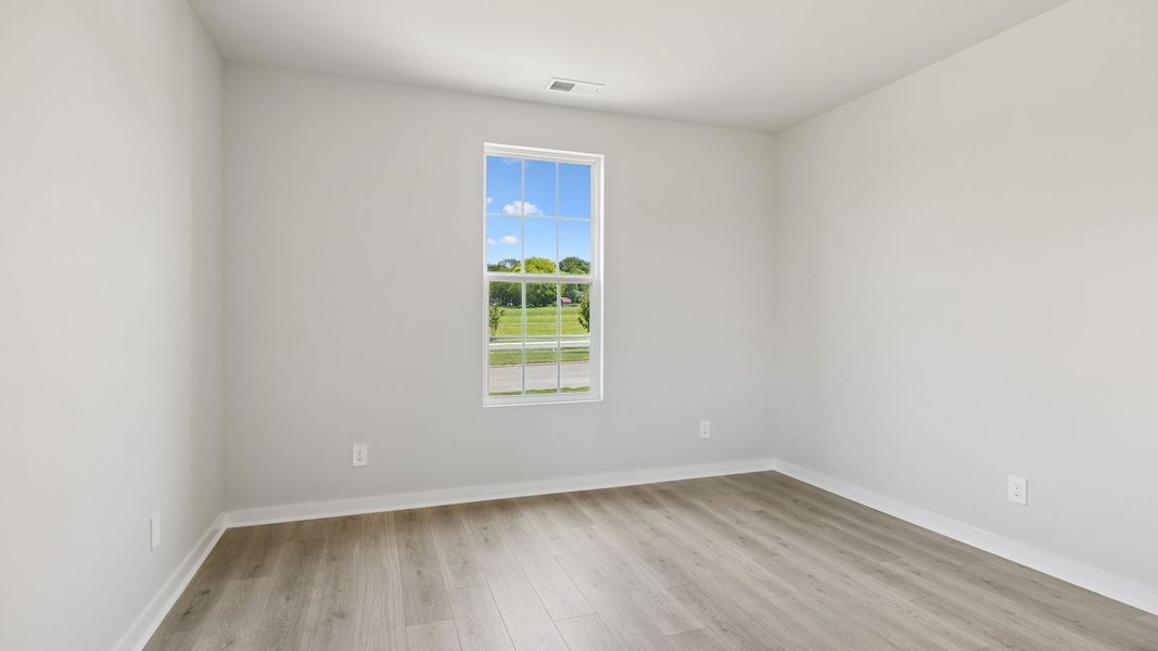 Representative unfurnished interior of a home built from the Ansley by D.R. Horton in Harvest Point, Spring Hill (Image 41).