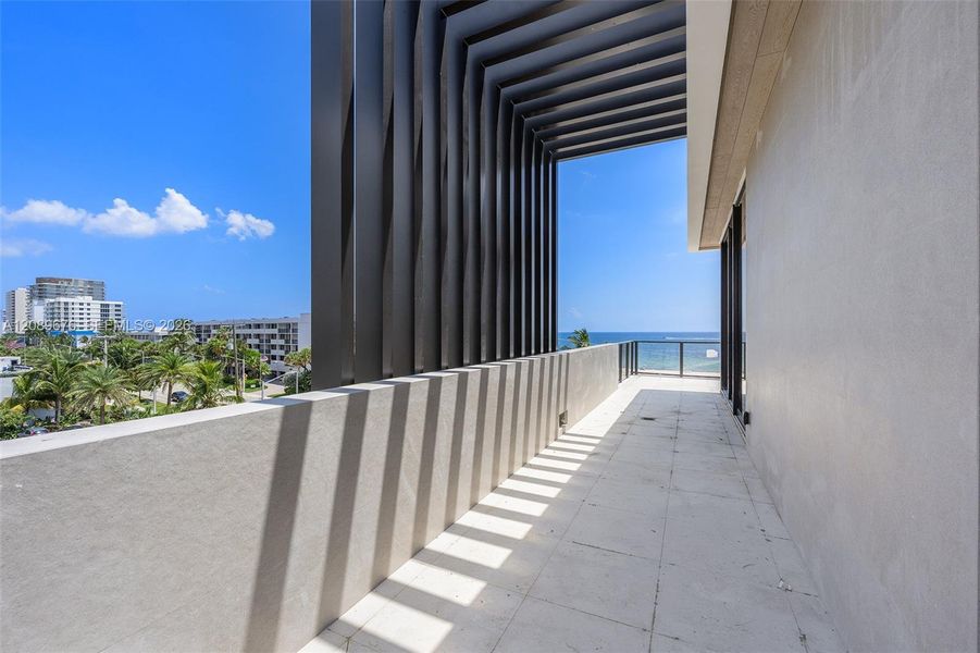 Louvered pergola, fourth-floor terrace. Louvered pergola, fourth-floor terrace.