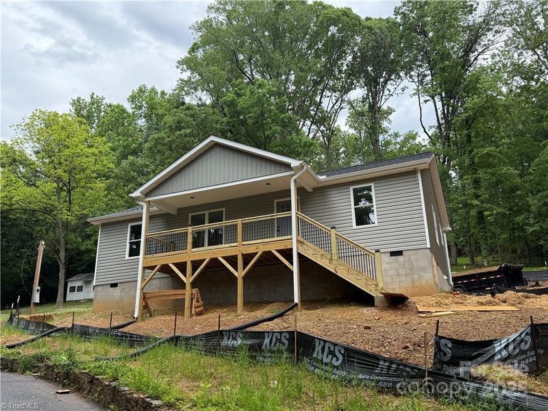 Front exterior of a new home in , Albemarle, NC, highlighting curb appeal (Image 1).