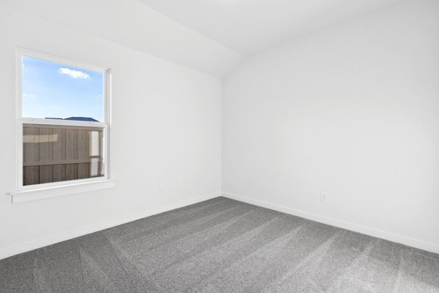 Spacious, unfurnished interior of a new home in The Colony, Bastrop (Image 26).