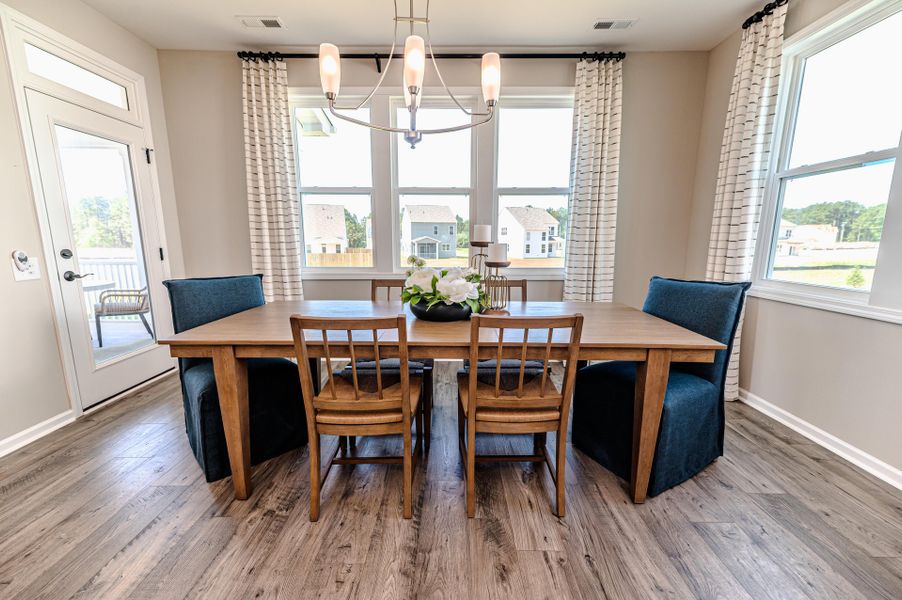 Representative furnished interior of a home built from the Watauga by McKee Homes in Terrapin, Leland (Image 5).