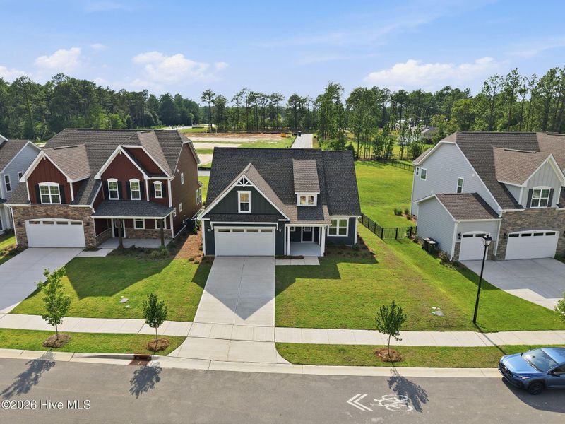 Front exterior of a new home in Legacy Lakes, Aberdeen, NC, highlighting curb appeal (Image 18).