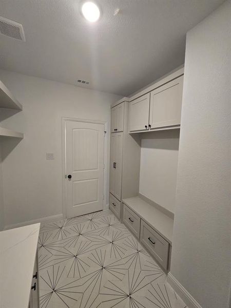 Mudroom with baseboards