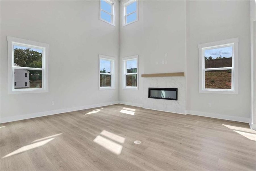 Spacious, unfurnished interior of a new home in The Paddocks at Doc Hughes, Buford (Image 17).
