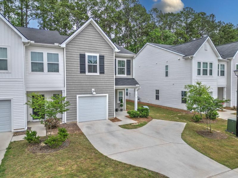 Front exterior of a new home in , Charleston, SC, highlighting curb appeal (Image 23).