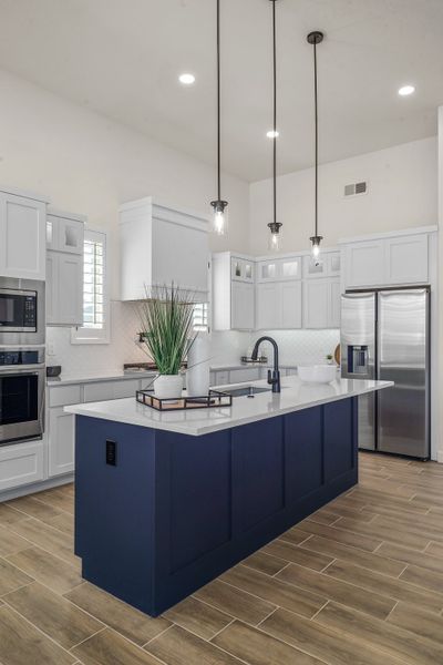 Representative furnished interior of a home built from the Escondido by LEH. Homes in Verdancia, El Paso (Image 41).