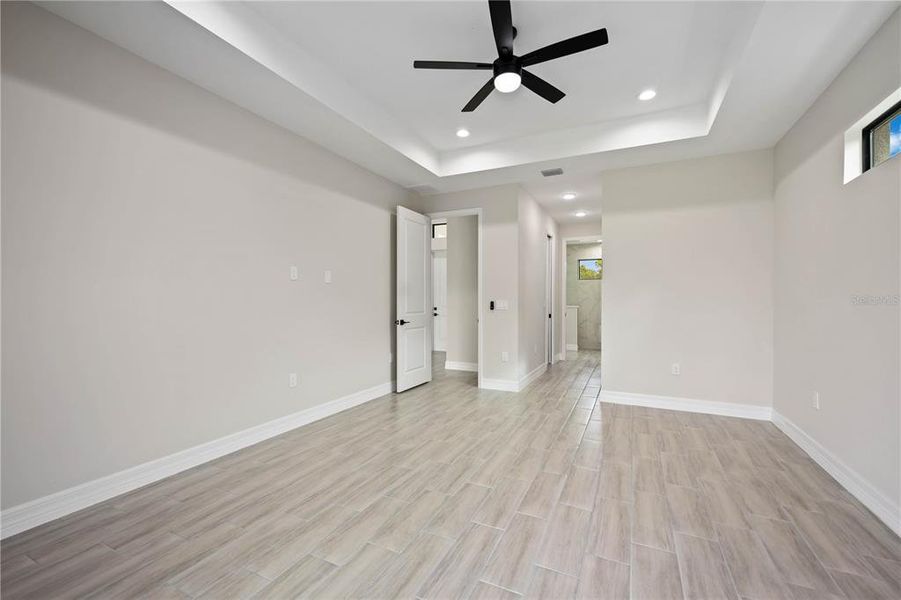 Spacious, unfurnished interior of a new home in , Port Charlotte (Image 26).