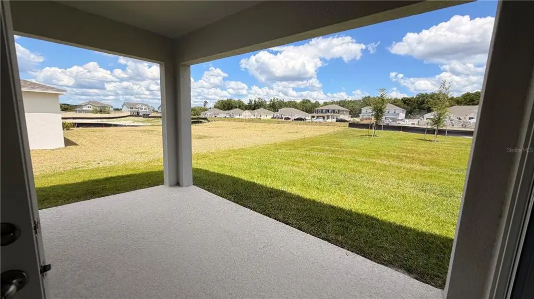 Exterior details and patio area of a home in Bargrove Estates, Mount Dora (Image 2). Exterior details and patio area of a home in Bargrove Estates, Mount Dora (Image 2).