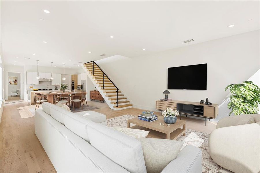 Living room with light hardwood / wood-style flooring