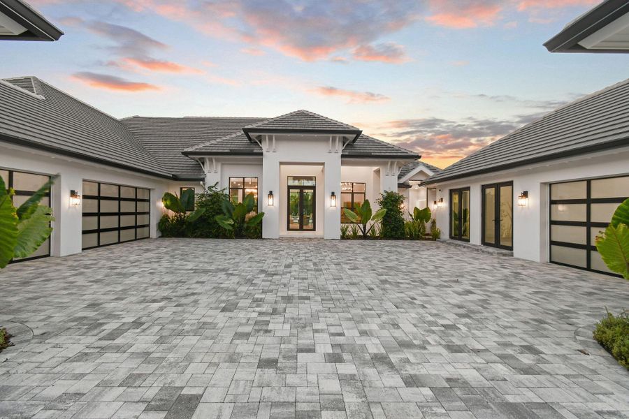 Exterior details and patio area of a home in , Palm Beach Gardens (Image 24).