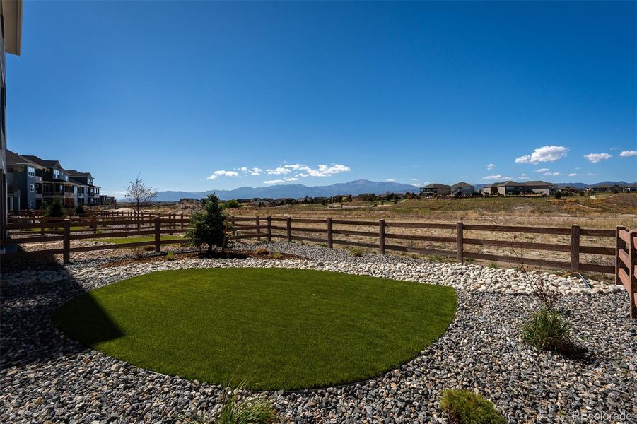 Exterior details and patio area of a home in Revel Crossing at Wolf Ranch - The Panorama Collection, Colorado Springs (Image 25).