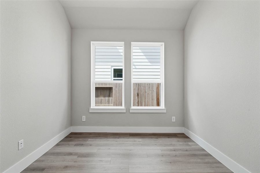 The Study provides the quiet retreat necessary for a productive home office, eliminating the daily commute and maximizing work-from-home efficiency. It features French doors, neutral toned walls, and large windows.