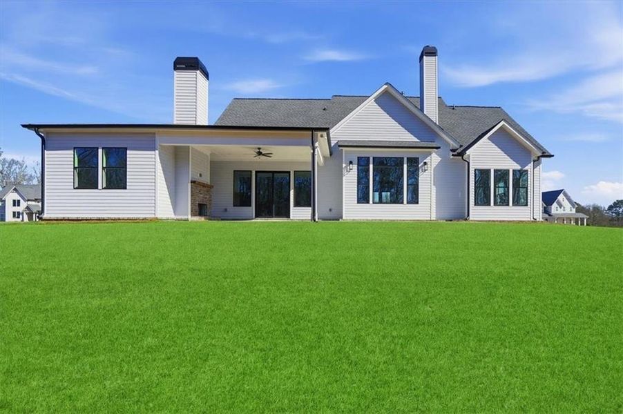 Exterior details and patio area of a home in Old Town Estates, Dacula (Image 31).