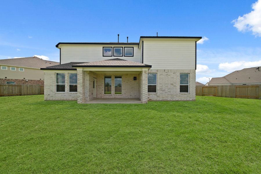 Front exterior of a new home in Beacon Hill, Waller, TX, highlighting curb appeal (Image 17). Front exterior of a new home in Beacon Hill, Waller, TX, highlighting curb appeal (Image 17).
