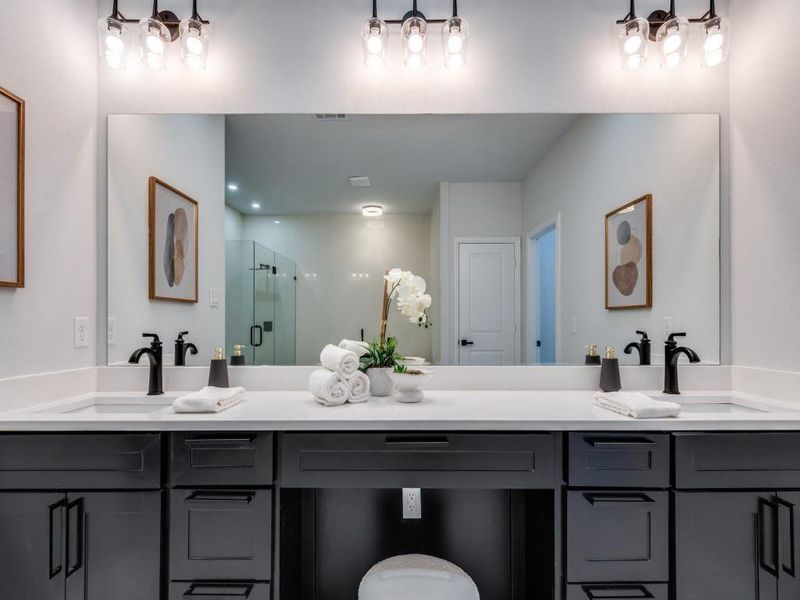 Bathroom featuring double vanity.