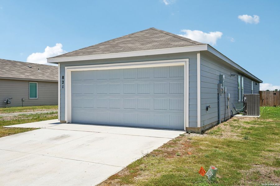 Front exterior of a new home in Steelwood Trails, New Braunfels, TX, highlighting curb appeal (Image 2).