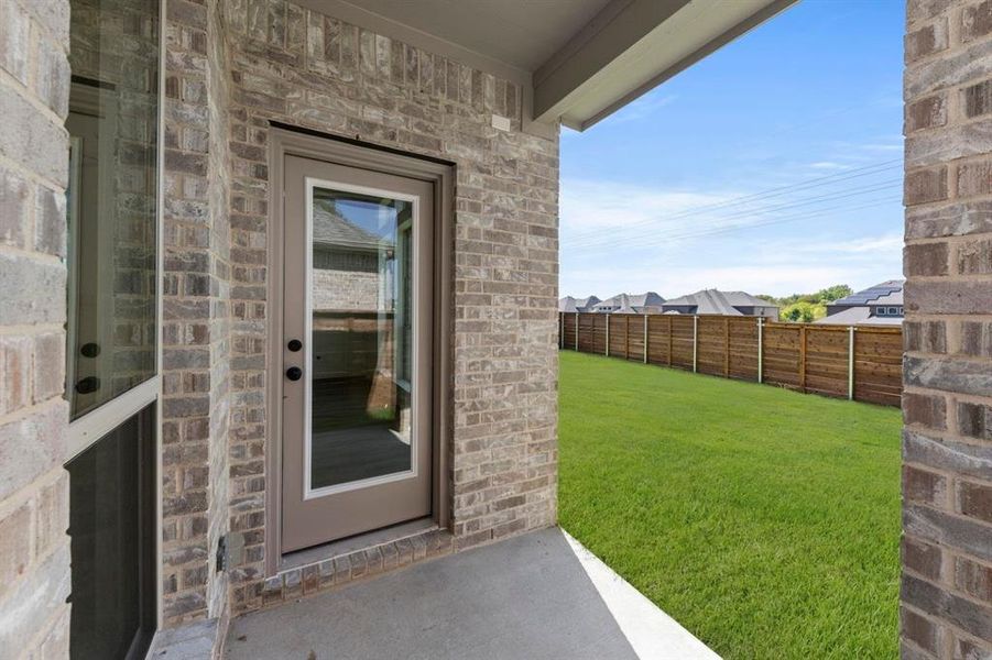 Exterior details and patio area of a home in Solterra, Mesquite (Image 24).