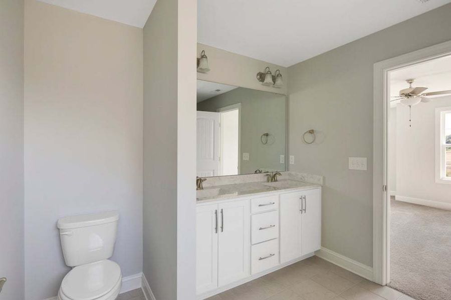 Representative furnished interior of a home built from the Drayton by Caviness & Cates Communities in Bartlett Manor, Youngsville (Image 54).