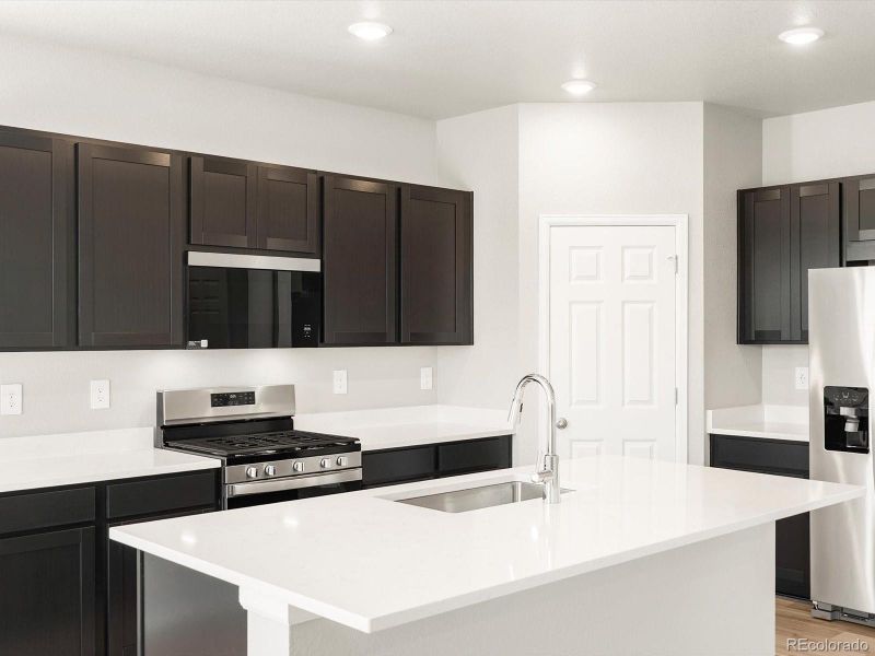 Furnished interior view inside a new home in Buffalo Highlands: The Flora Collection, Commerce City (Image 9).