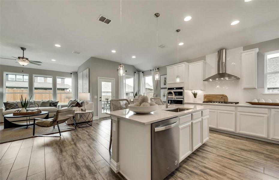*Model Representation - Large island overlooking gathering room and dining areas *Model Representation - Large island overlooking gathering room and dining areas