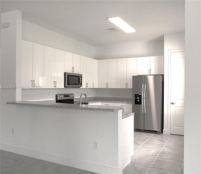 Furnished interior view inside a new home in , Miami (Image 7). Furnished interior view inside a new home in , Miami (Image 7).