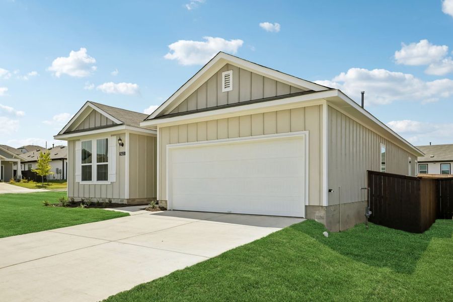 Front exterior of a new home in Cloverleaf, Austin, TX, highlighting curb appeal (Image 18).