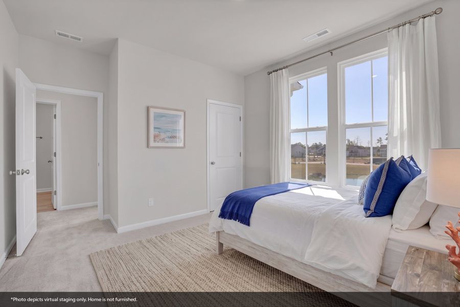 Furnished interior view inside a new home in Grand Park, Leland (Image 11). Furnished interior view inside a new home in Grand Park, Leland (Image 11).