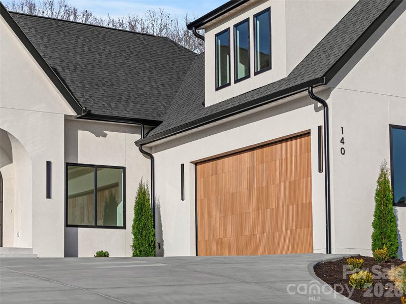 Exterior details and patio area of a home in , Fletcher (Image 30).